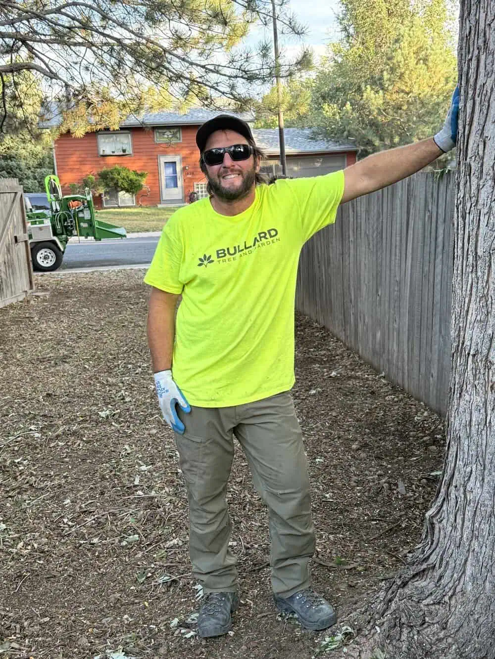 Forrest Bullard, certified arborist and owner, inspecting tree health in Gooding, Colorado