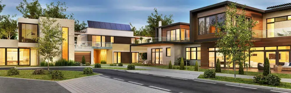 Private residence backyard with large deciduous trees professionally pruned for health and safety